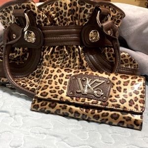 Kathy Van Zeeland leopard purse and matching wallet.